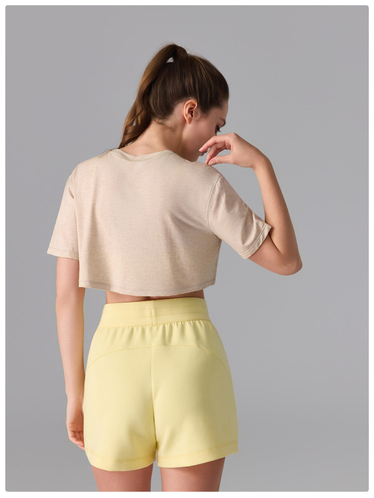 Camiseta deportiva de licra, estilo corto y holgado, transparente, de secado rápido y suave al tacto, ideal para fitness, running y yoga.