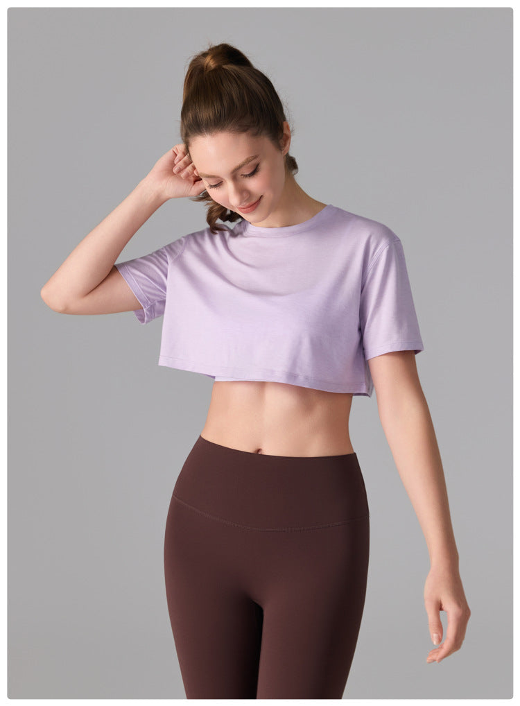 Camiseta deportiva de licra, estilo corto y holgado, transparente, de secado rápido y suave al tacto, ideal para fitness, running y yoga.