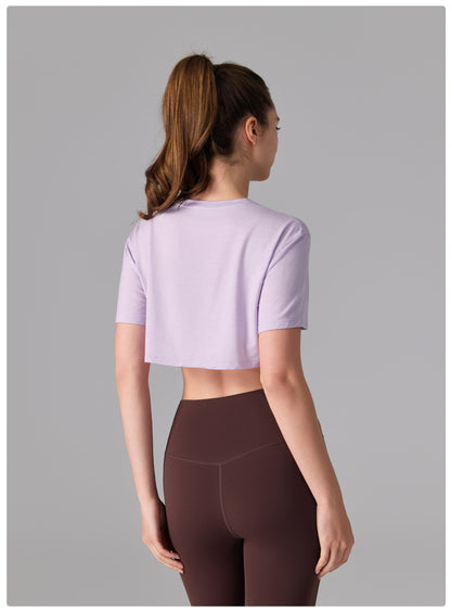 Camiseta deportiva de licra, estilo corto y holgado, transparente, de secado rápido y suave al tacto, ideal para fitness, running y yoga.